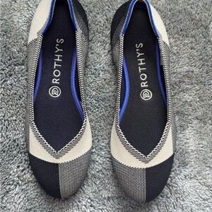 Rothy's Black and Cream Flats with Blue Accents